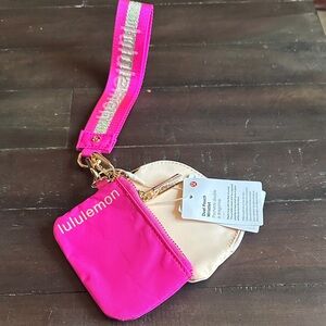 Lululemon Dual Pouch Wristlet in Sonic Pink.